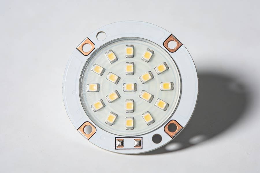 Compact COB LED grow light PCB modules on a metal-core board, showing round LED module footprints with mounting holes and connection pads.