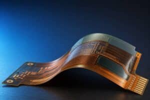 Flexible PCB materials guide cover showing a flex circuit with PI, copper, coverlay, and reinforcement layers