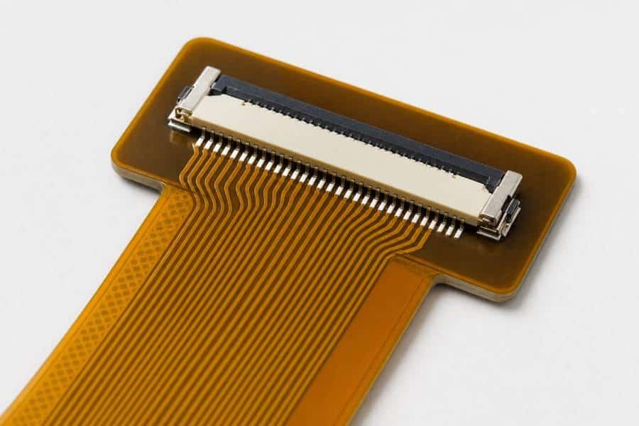 Close-up of a flexible PCB connector area with a stiffener for improved support and assembly reliability.